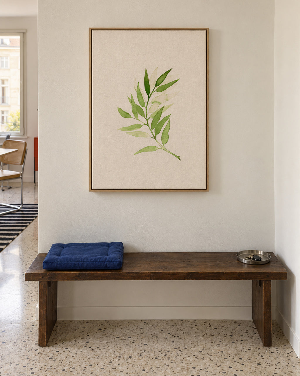 Olive Green Branch - Framed canvas in an interior