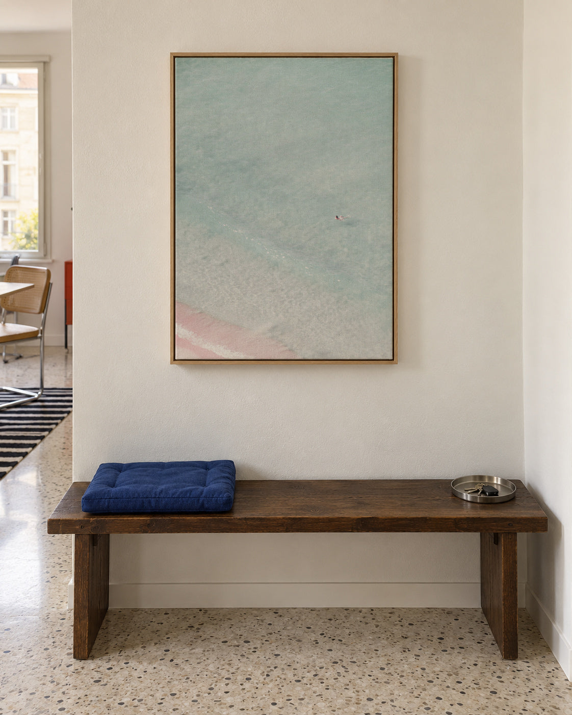 The swimmer - Framed canvas in an interior