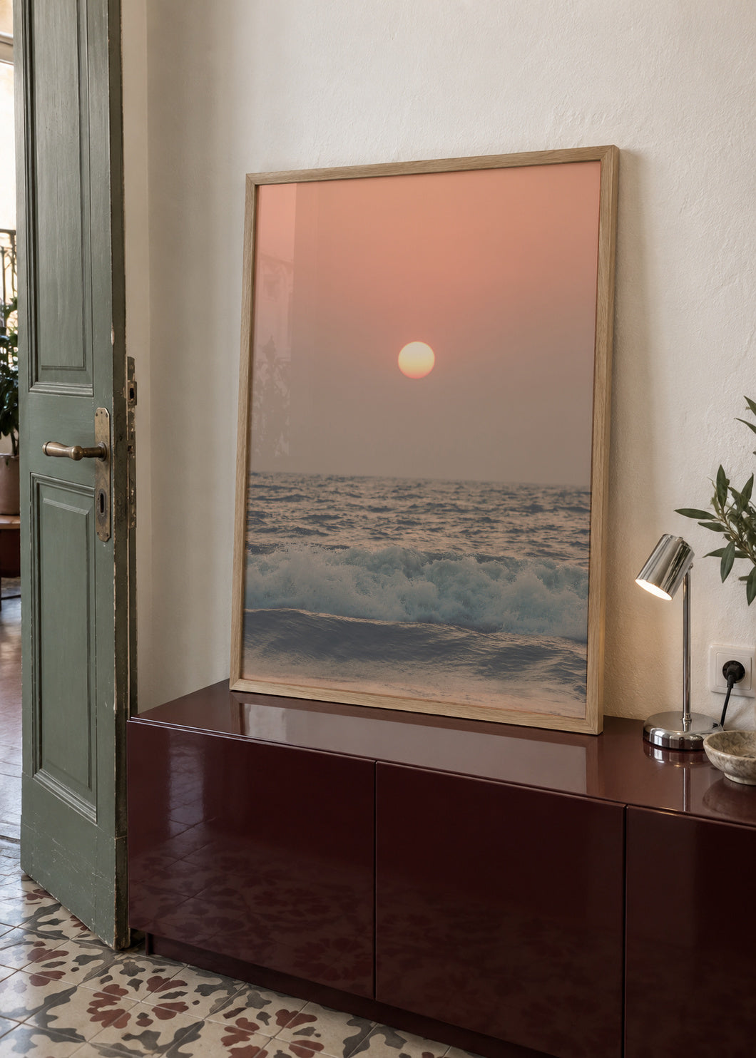 Pink beach sunset - Framed poster in an interior