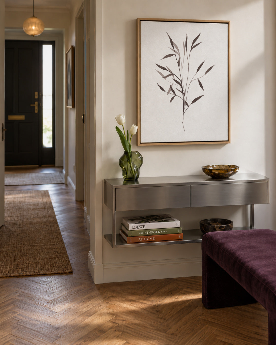 Black leaf - Framed canvas in an interior