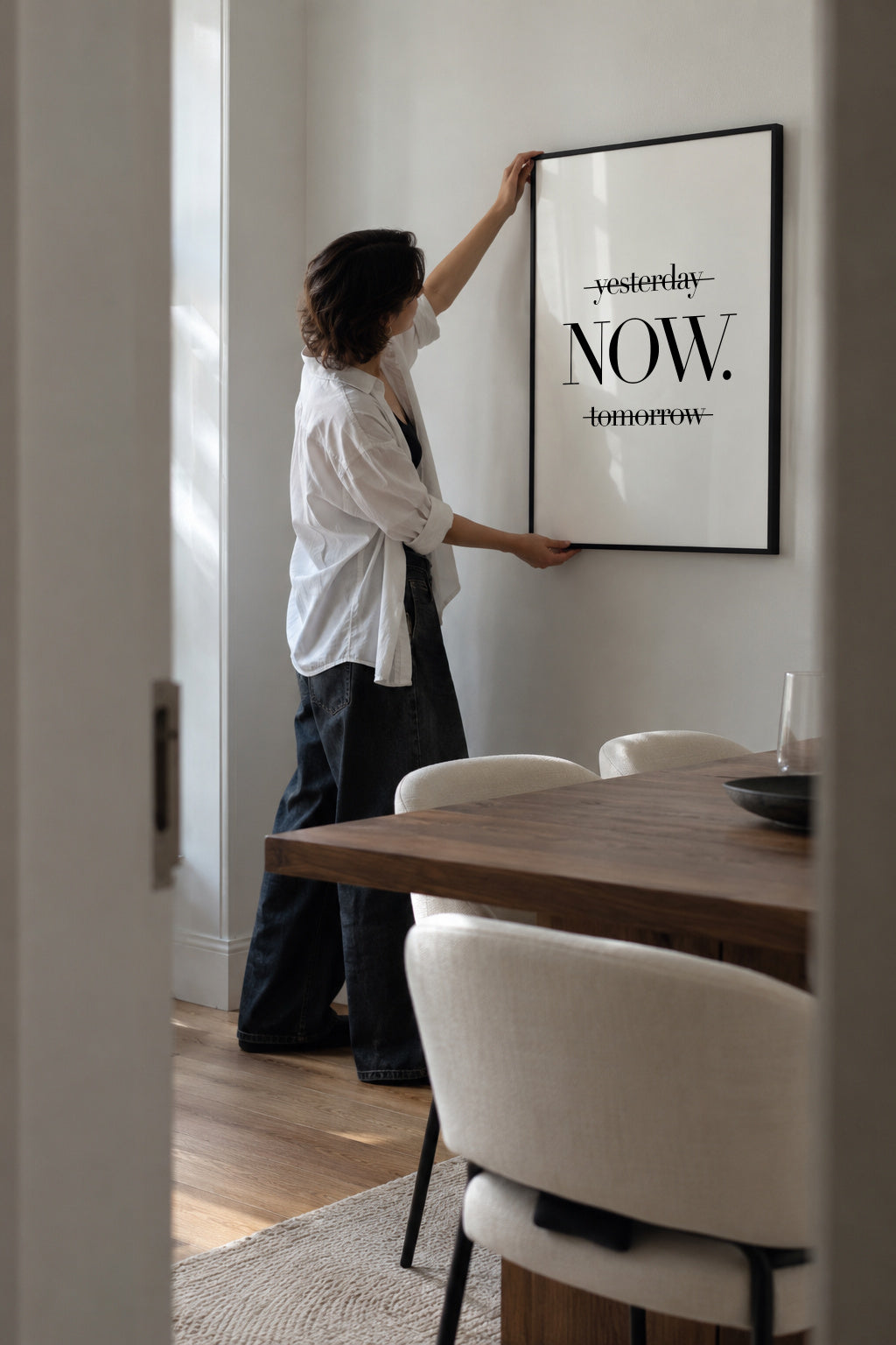Now - Framed poster in an interior