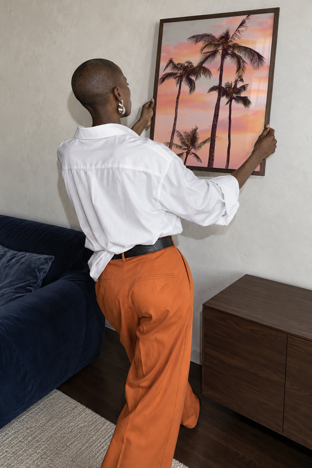 Sunset Palm Trees - Framed poster in an interior