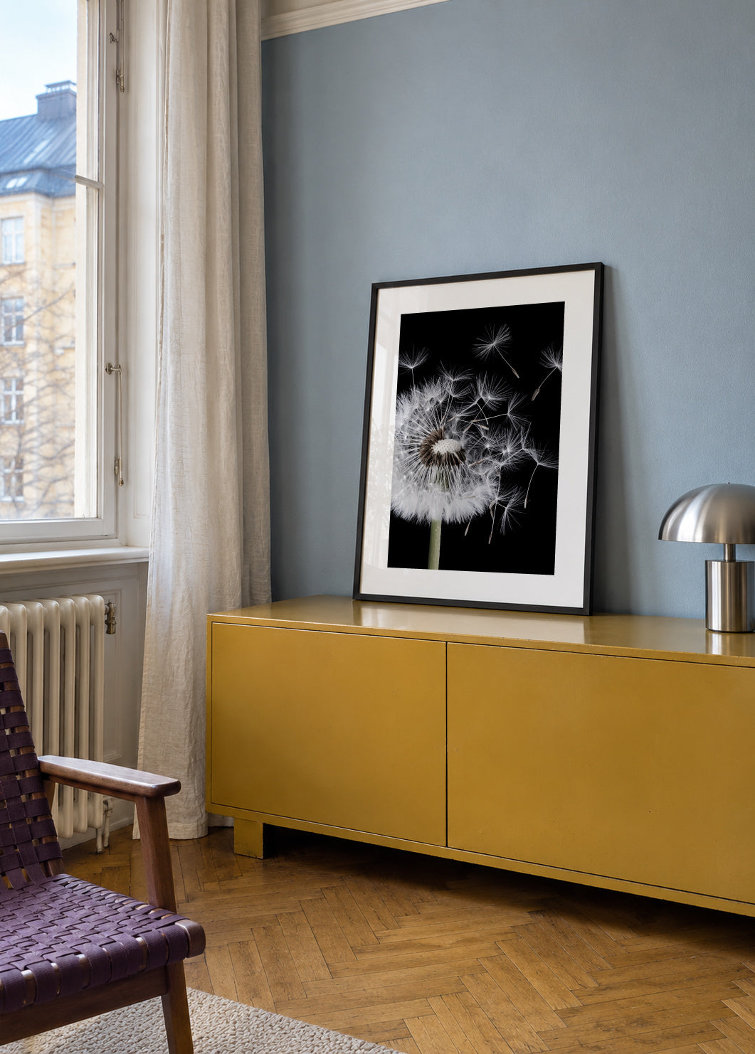 Dandelion Blowing - Framed poster in an interior