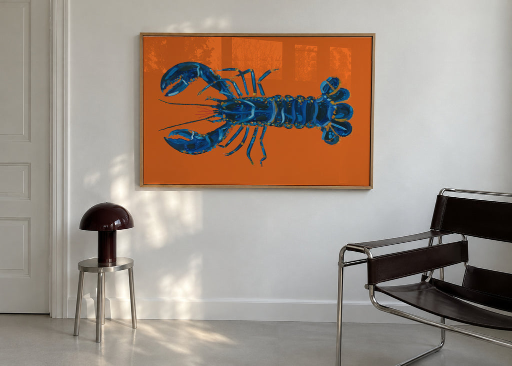 Lobster On Orange - Framed poster in an interior