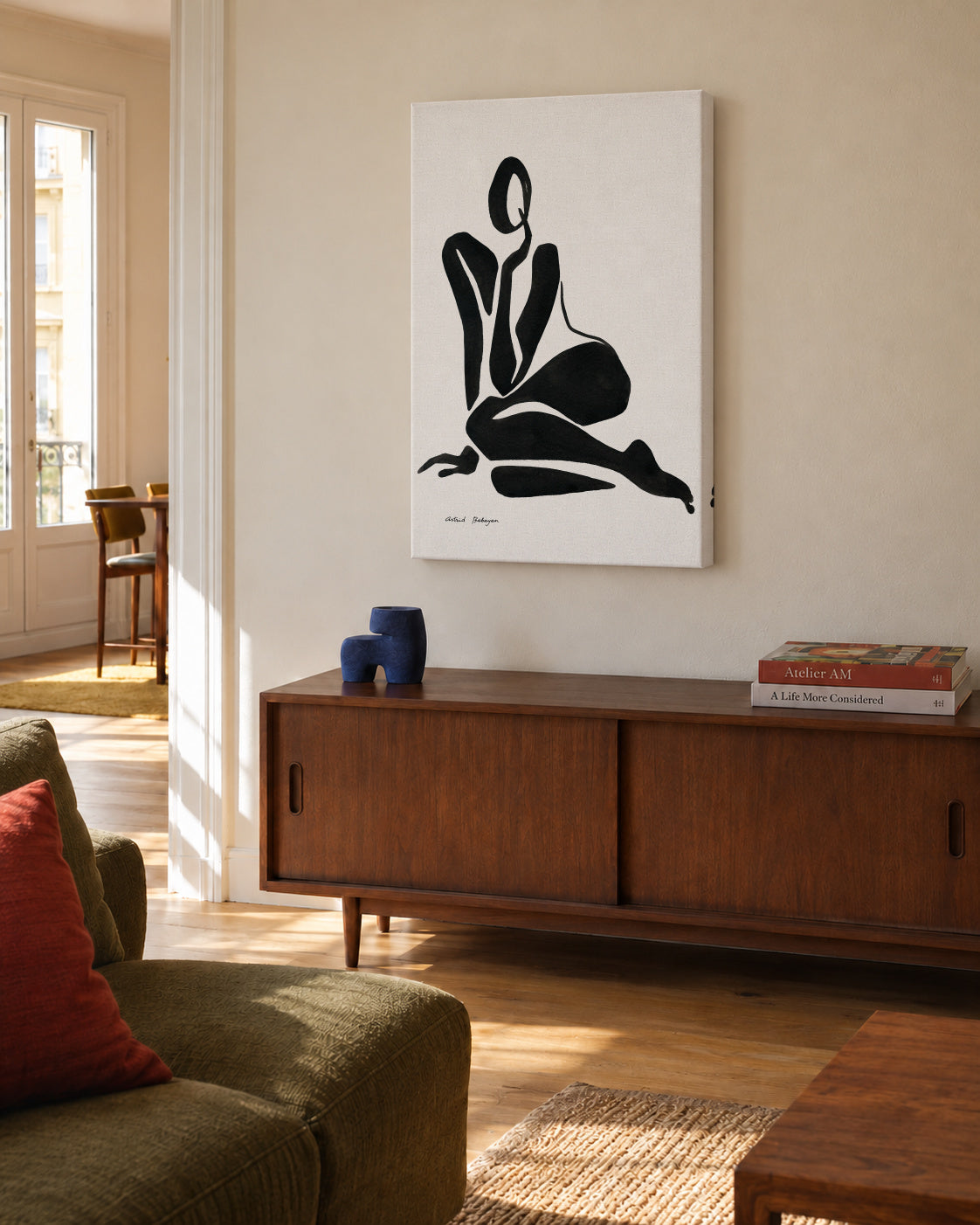 Black figure #6 - Unframed canvas in an interior