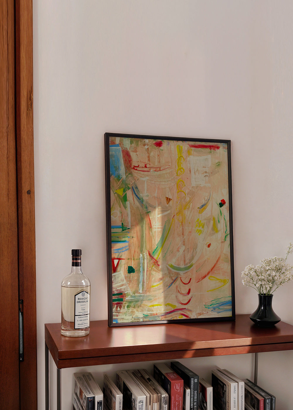 Fluyendo - Framed poster in an interior