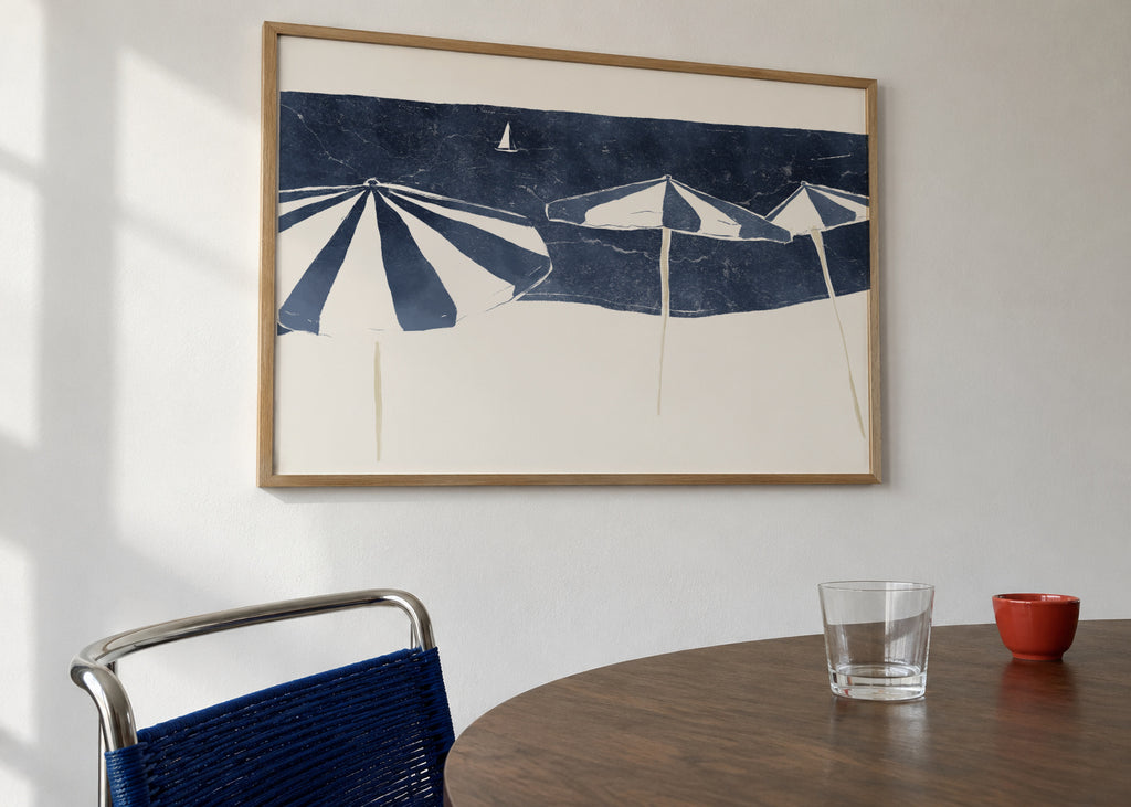 Blue Umbrellas and Sailboat - Framed poster in an interior