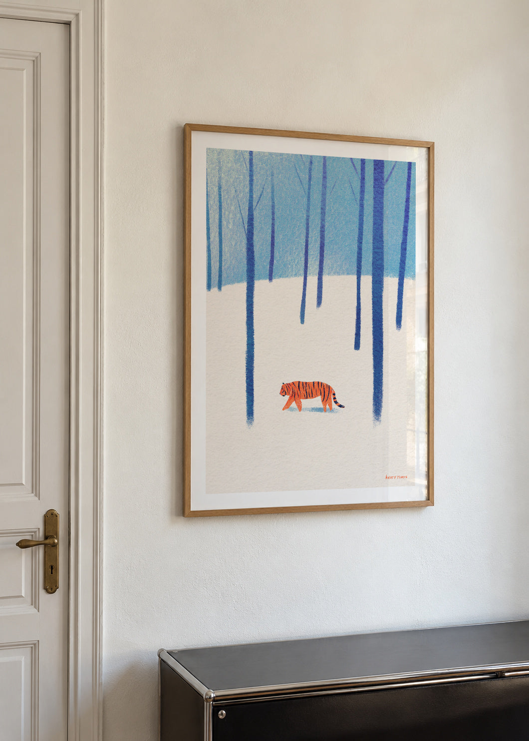 Tiger in the snow - Framed poster in an interior