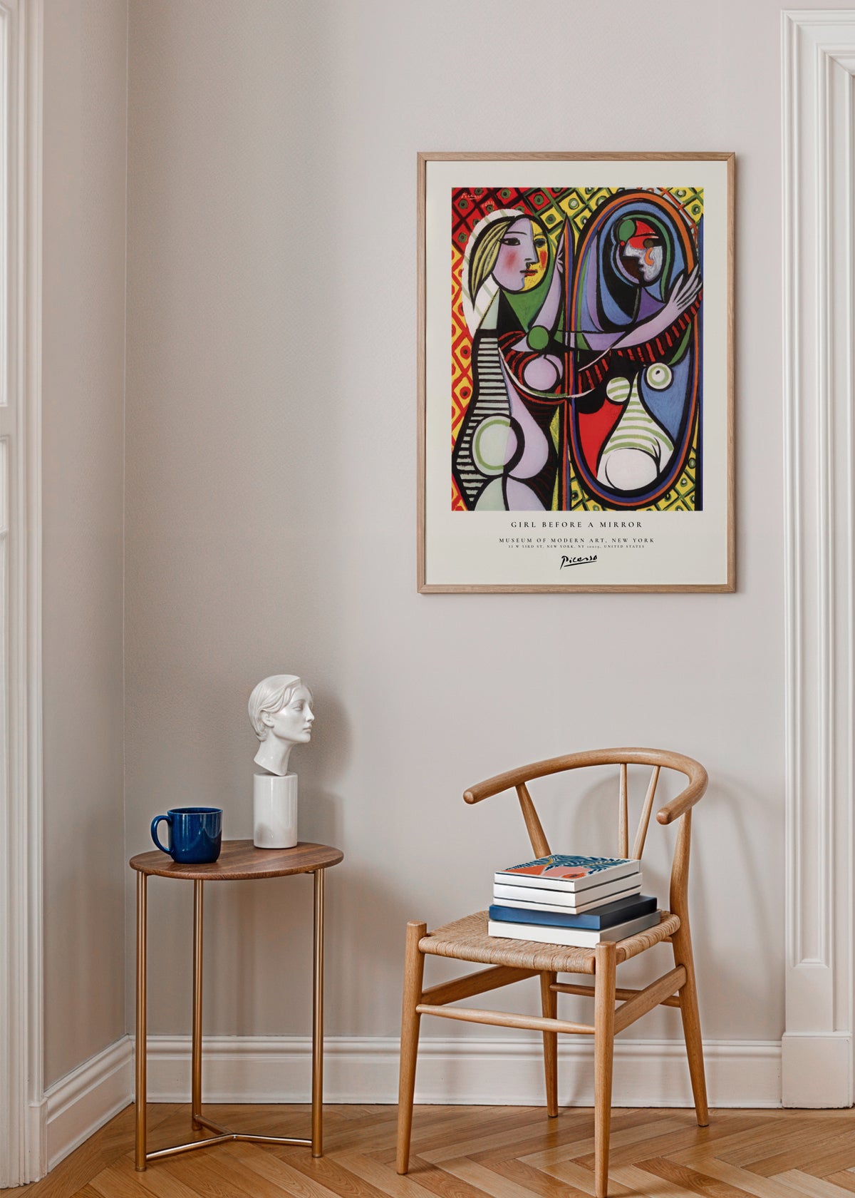 Girl before a Mirror by Pablo Picasso - Framed poster in an interior