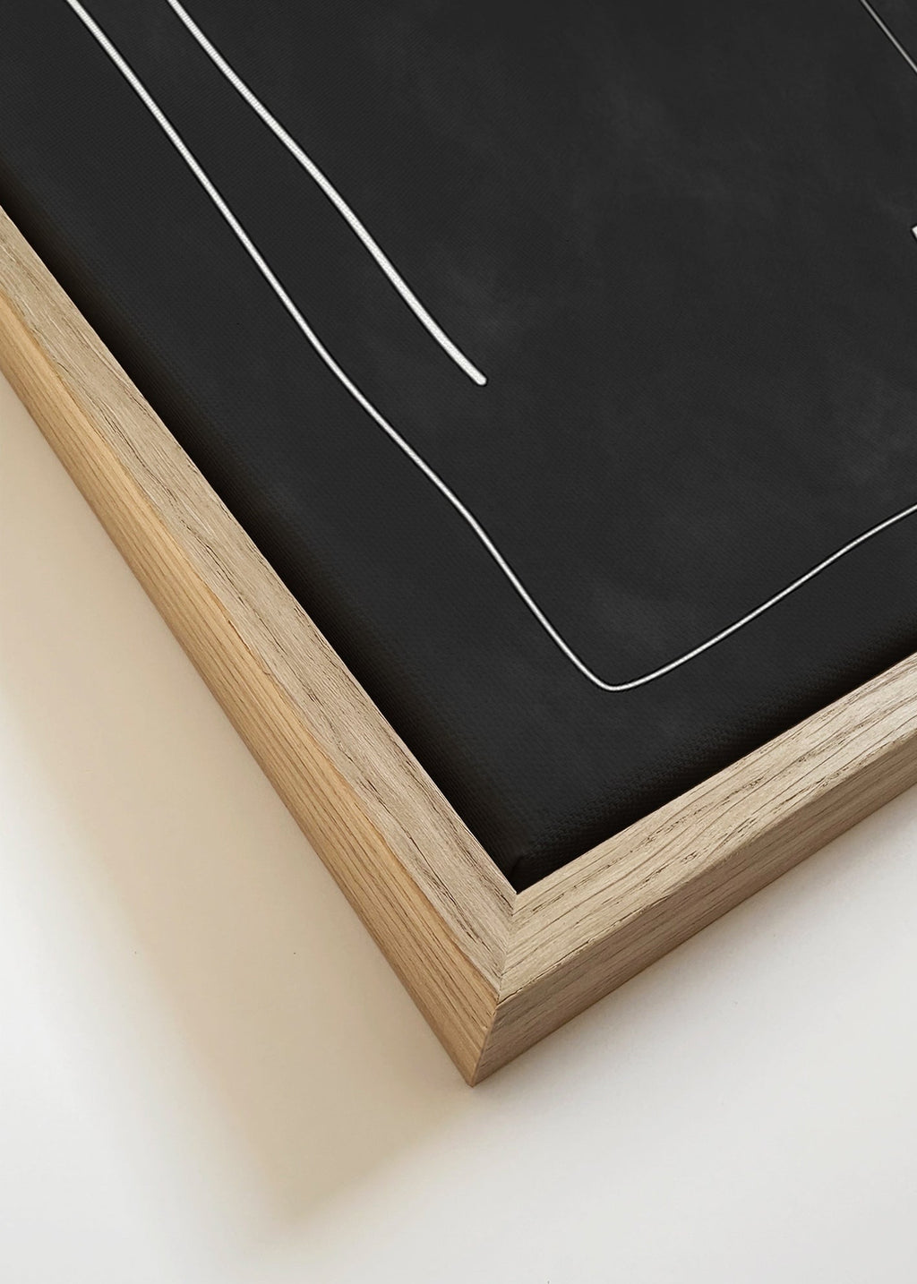 Cuadro minimalista de líneas blancas sobre fondo negro – Canvas detail