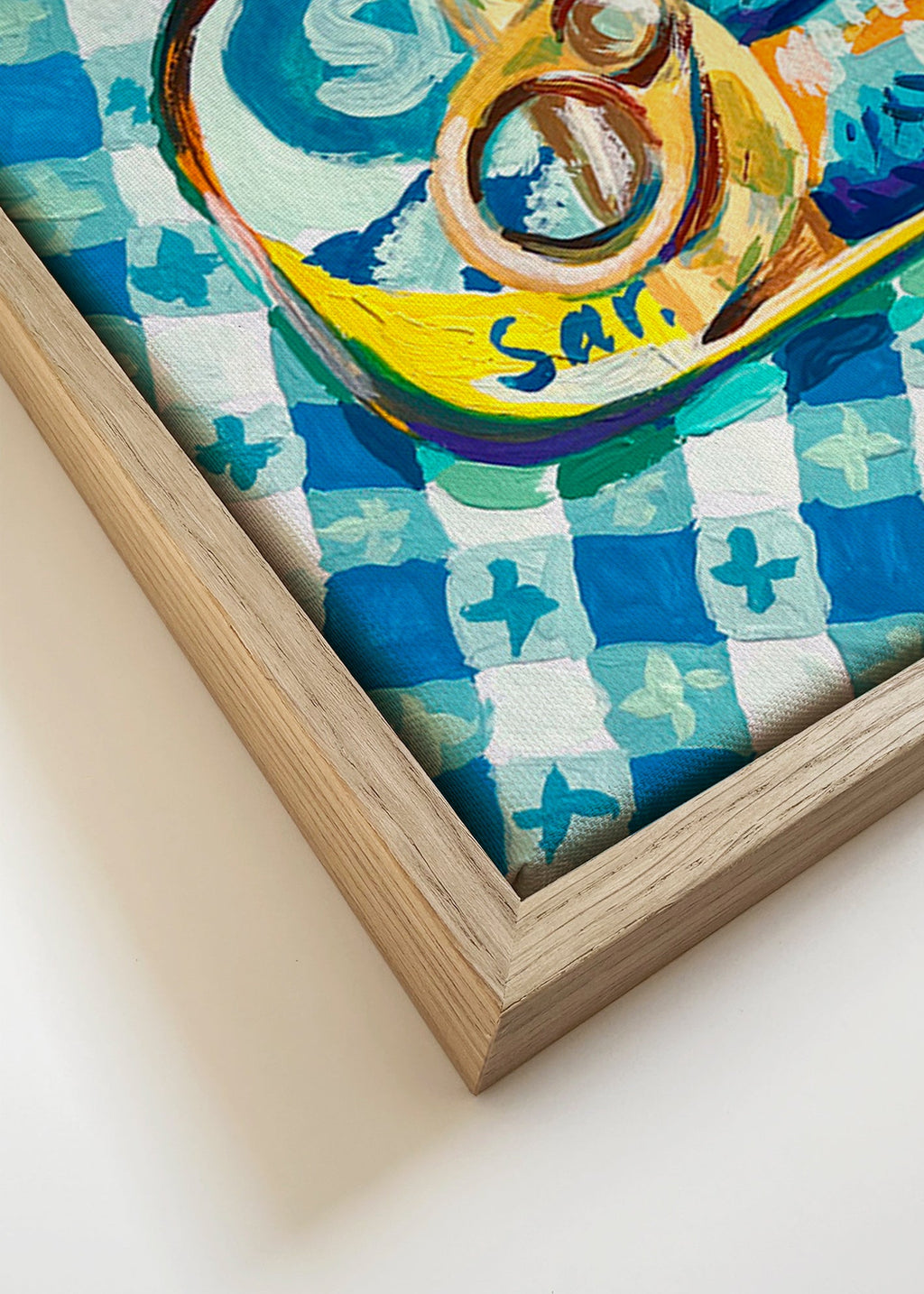Cuadro de cocina: lata de sardinas sobre mantel a cuadros – Canvas detail