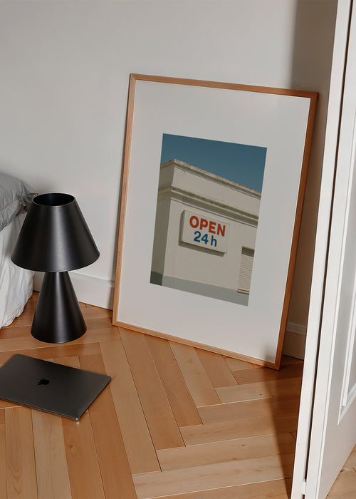 Open 24h - Framed poster in an interior