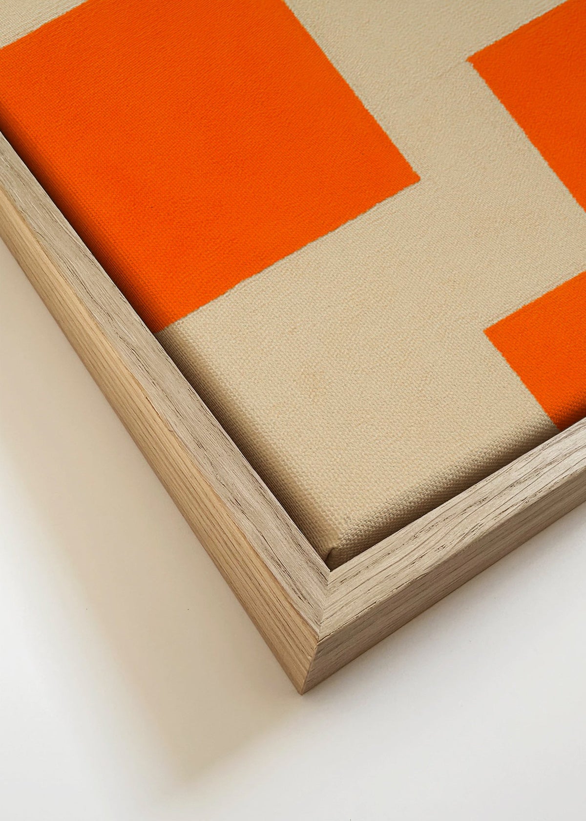Cuadro geométrico en naranja y beige con bloques modulares – Canvas detail