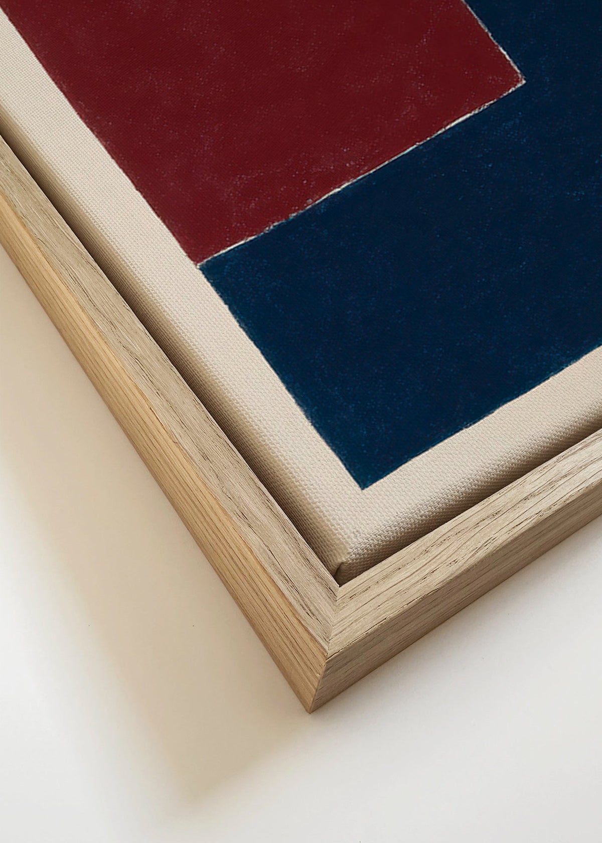 Cuadro geométrico con bloques burdeos y azul – Canvas detail