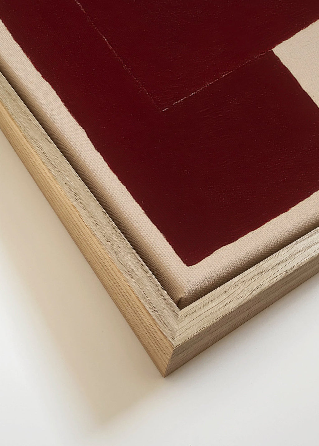 Cuadro abstracto con bloques granate – Canvas detail