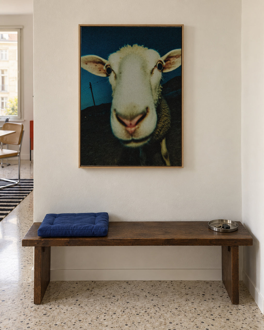 Curious Sheep - Framed canvas in an interior