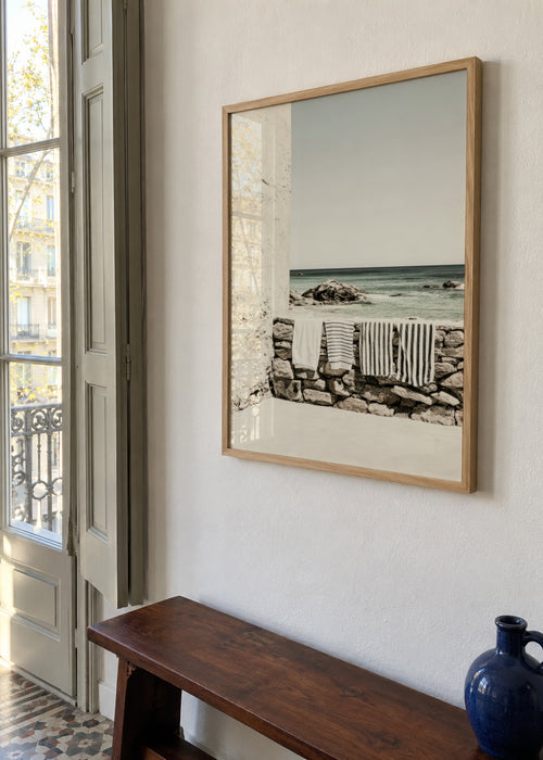 Seaside Towels - Framed poster in an interior