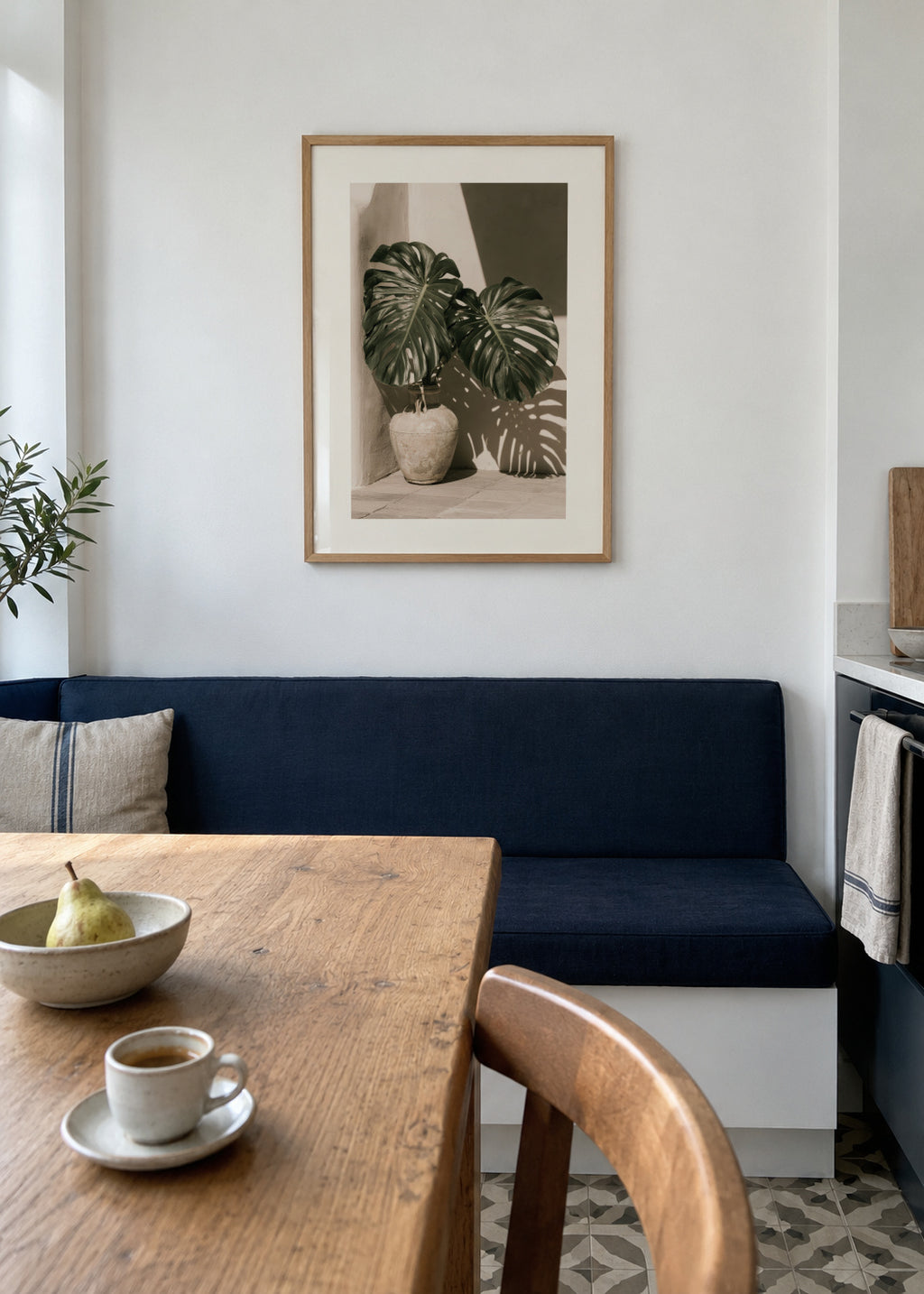 Monstera Shadow - Framed poster in an interior